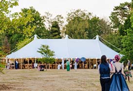 Happy bride and groom after their outdoor wedding ceremony