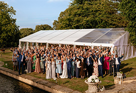 All guests wave outside the marquee