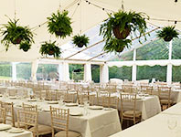 Marquee with hanging foliage baskets