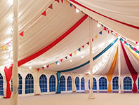 Marquee roof decorated with fabric overlays