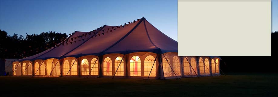 Traditional style tent lit up at night
